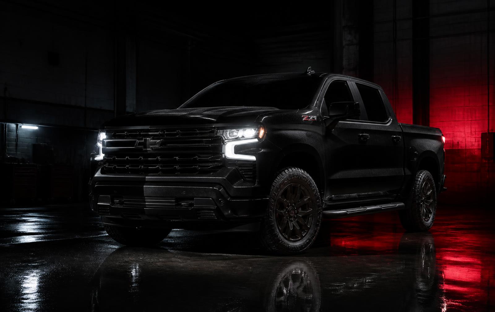 Blacked-out pickup truck in a dark industrial garage